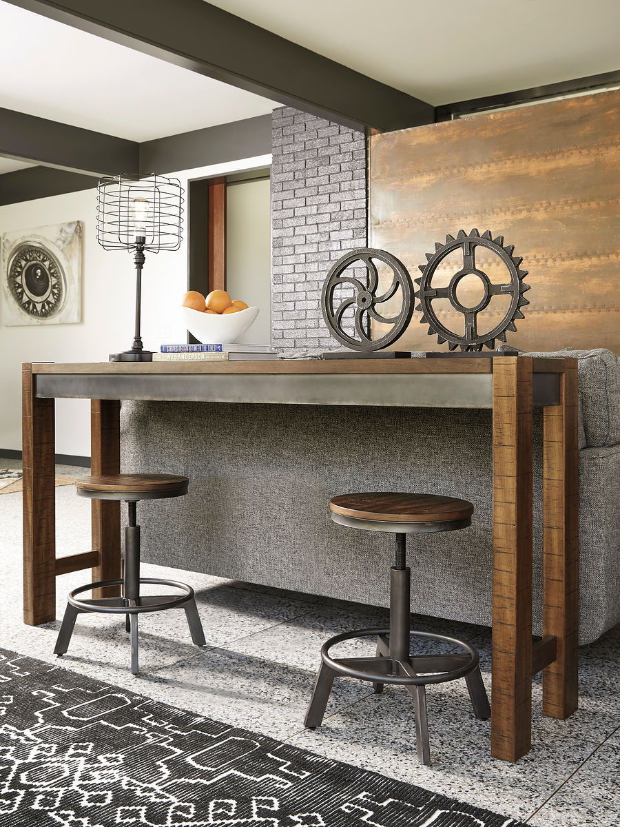 Torjin - 3 Pc. - Long Counter Table, 2 Stools - Dark Brown - Image 1