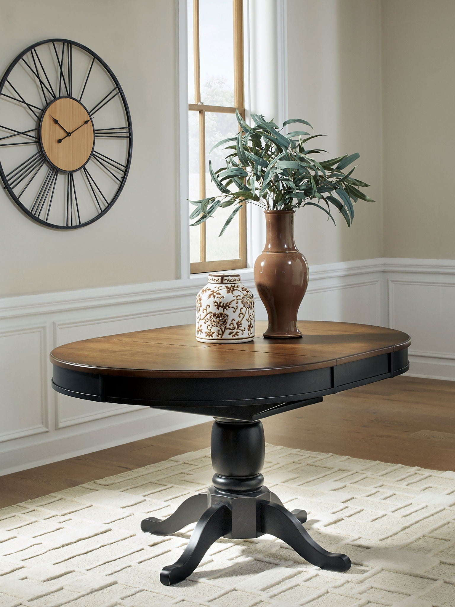 Clorazi - Oval Dining Room Butterfly Extension Table - Black / Brown - Image 3