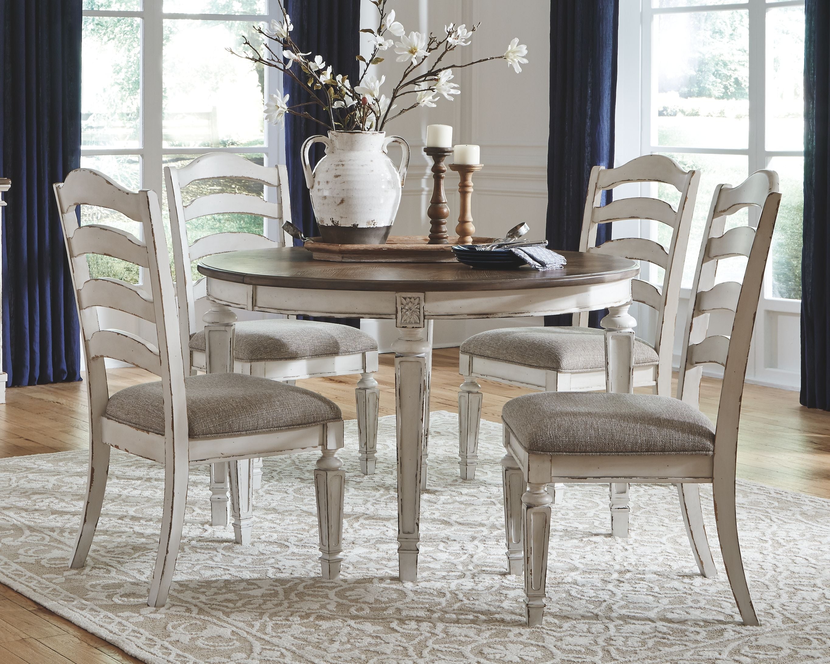 Realyn – Oval Dining Table Set